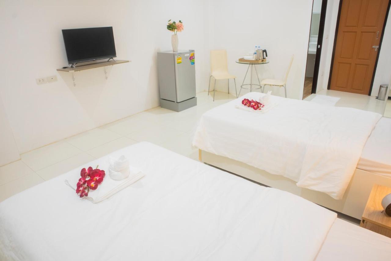 ตะวันแมนชั่น Apartamento Ban Na Kha Exterior foto